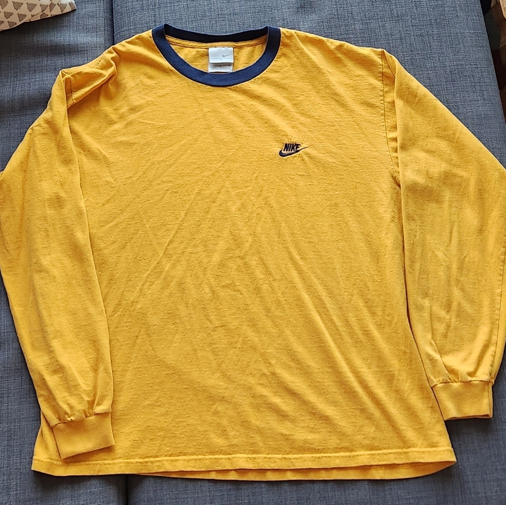 Mustard yellow Nike long sleeve shirt with navy collar